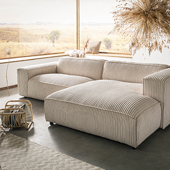 Beiges Bigsofa mit breitem Cordstoff